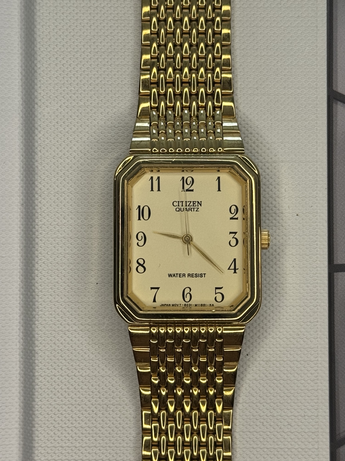 Original watch face and dial photograph of Citizen Quartz Gold-Tone Rectangular Arabic Numeral Dress Watch